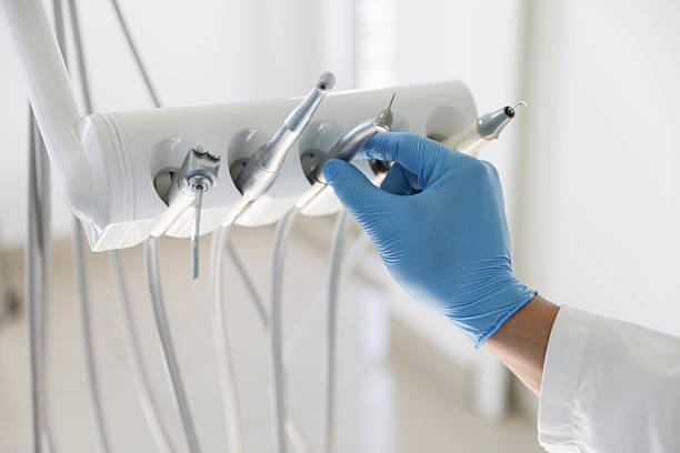 Professional Tooth Extraction technician working in Colonial Heights city County, VA